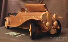 Classic car carving hood open