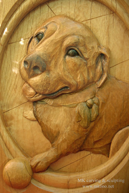 Dog relief woodcarving 1