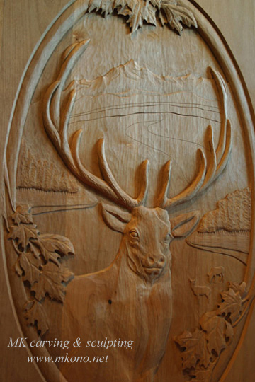 Elk carved door up