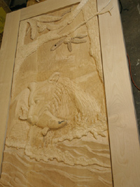 progress4 carved door bear