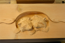 progress4 raccoons wood carving