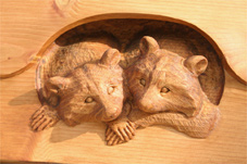 progress5 raccoons wood carving